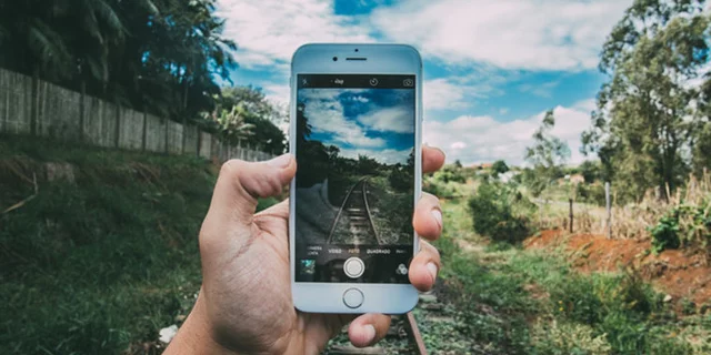 An iPhone snapping a photo.