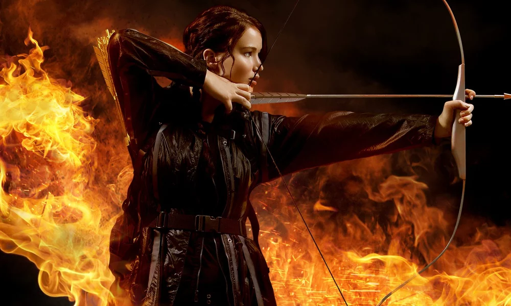 Katniss Everdeen shooting a bow
