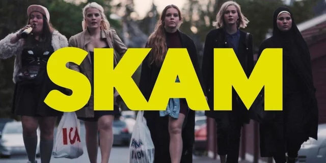Five of the main characters of Skam walking, with yellow text saying SKAM in front of them.