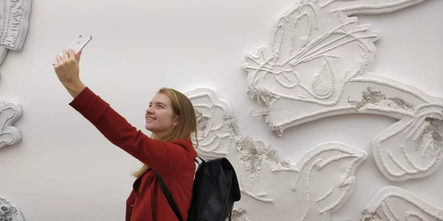 Selfie taking at a museum